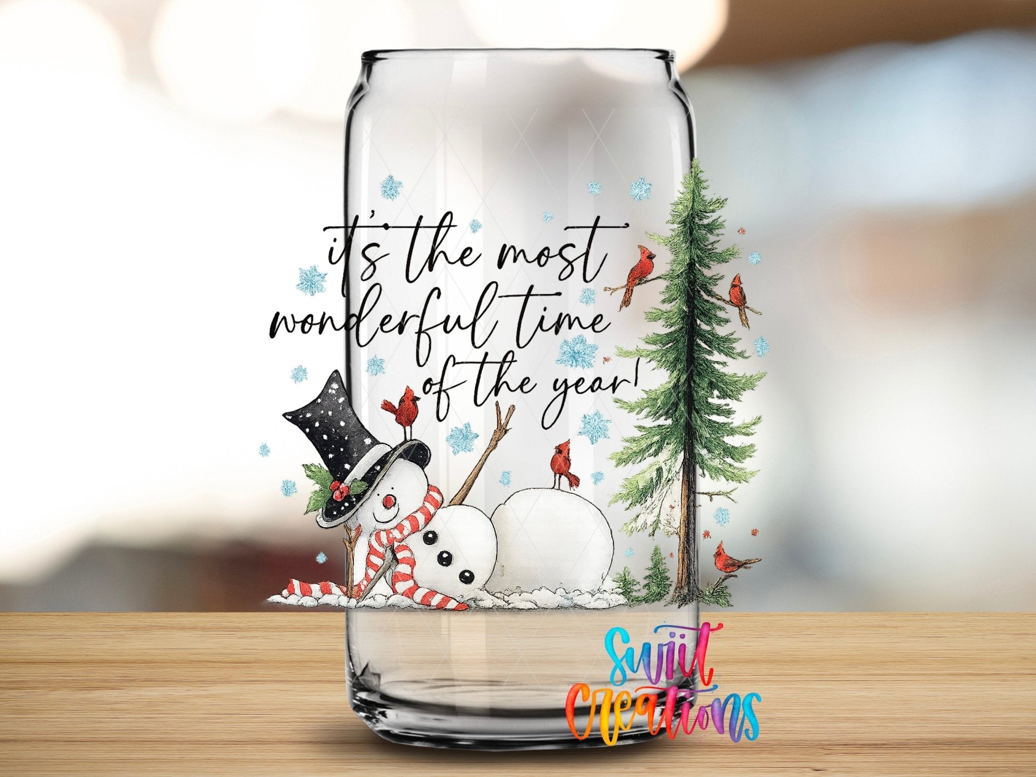 Most Wonderful Time Of The Year Snowman UV DTF transfer applied to a clear glass can from Swiit Creations