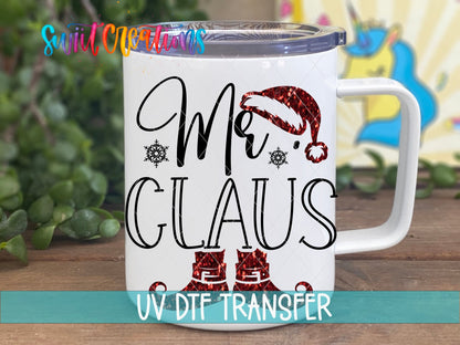 Mr. Claus UV DTF transfer on a white stainless steel mug with a lid