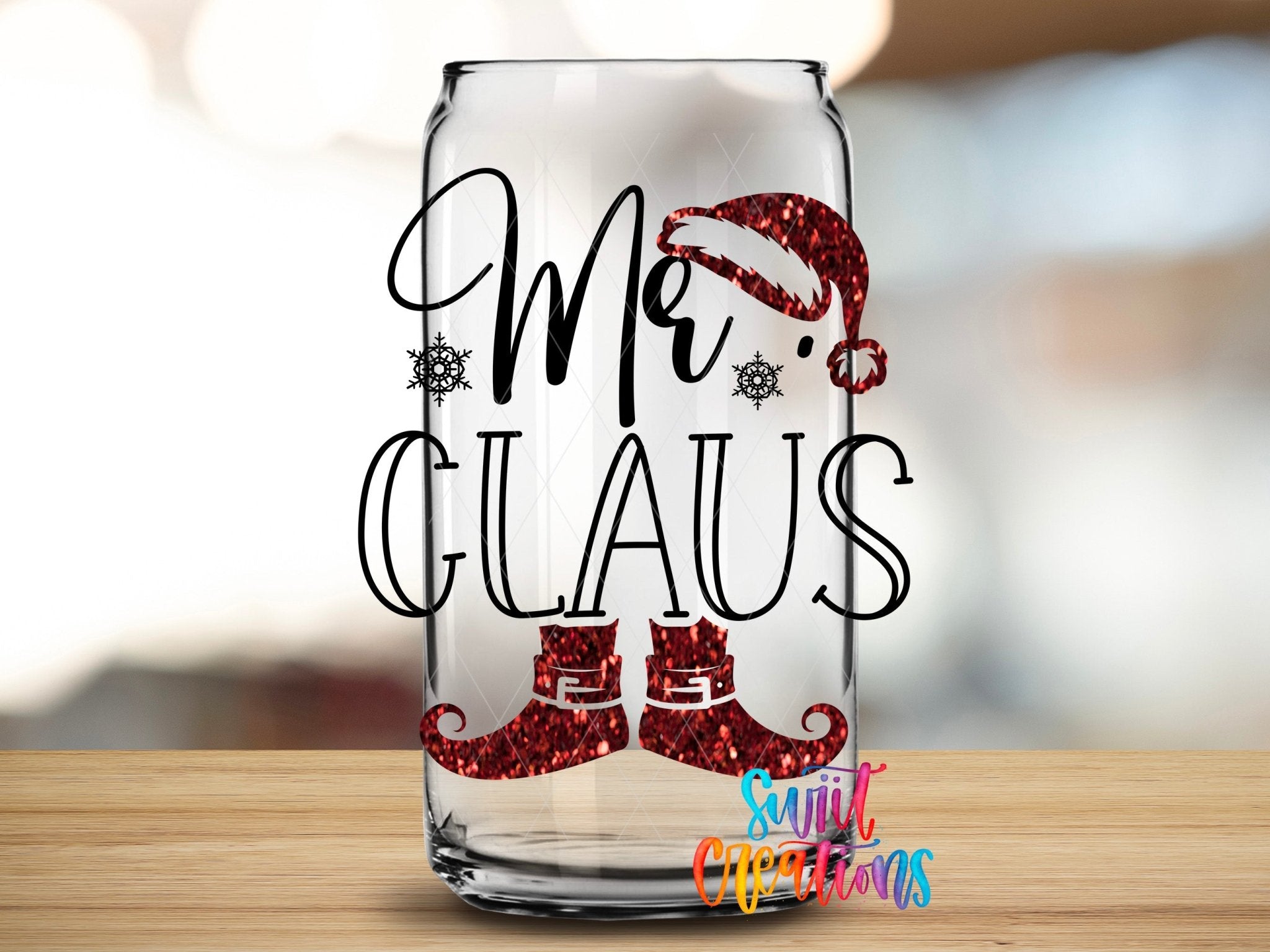 Swiit Creations UV DTF Mr Claus Christmas transfer applied to a clear glass can