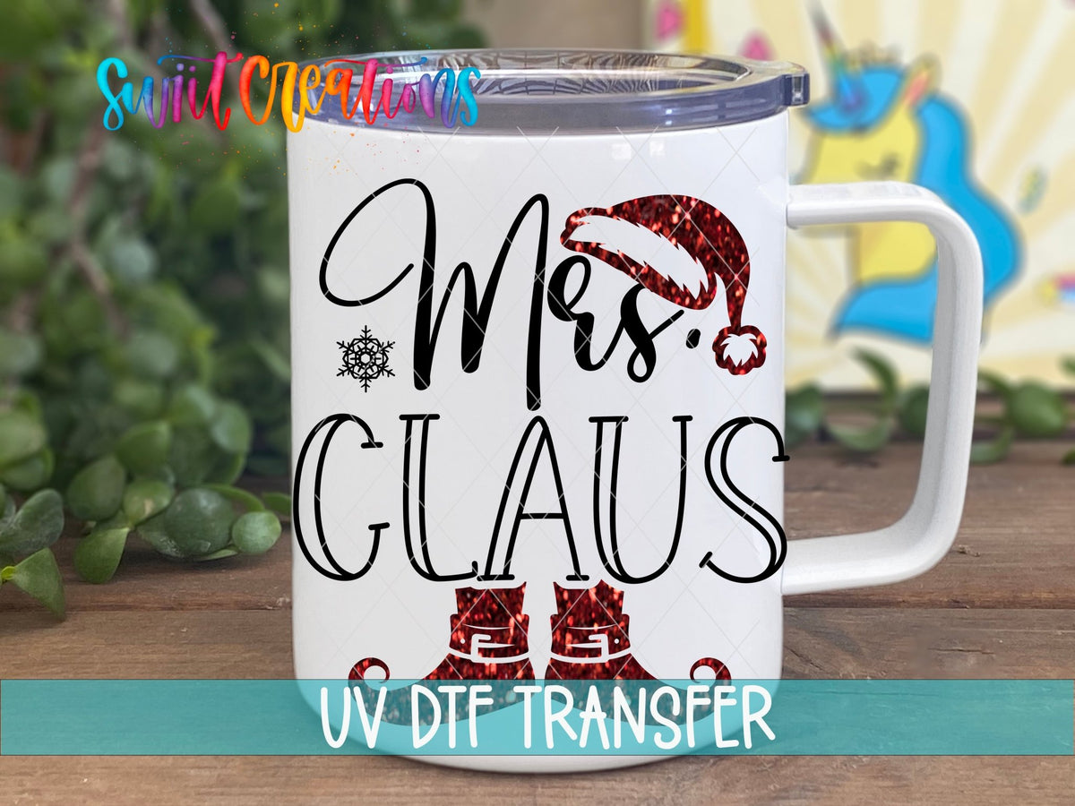Mrs. Claus UV DTF transfer on a white stainless steel mug with a lid