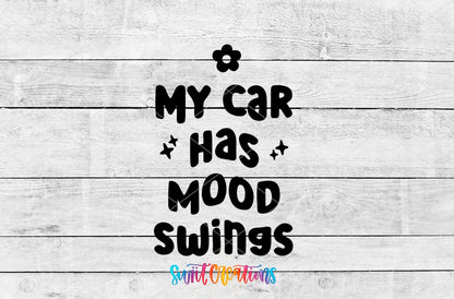 My Car Has Mood Swings UV DTF transfer artwork on a gray wood background