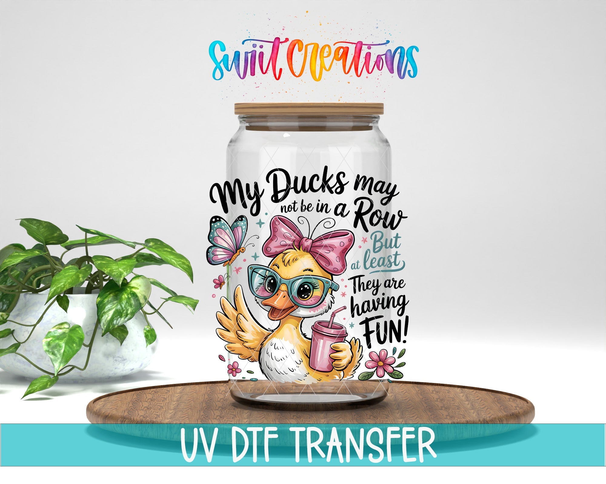 My Ducks May Not Be In A Row Funny Duck UV DTF transfer displayed on a clear jar mockup from Swiit Creations