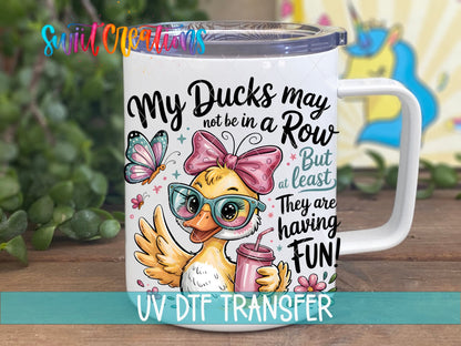 My Ducks May Not Be in a Row duck with a pink drink UV DTF transfer on a white stainless steel mug with a lid