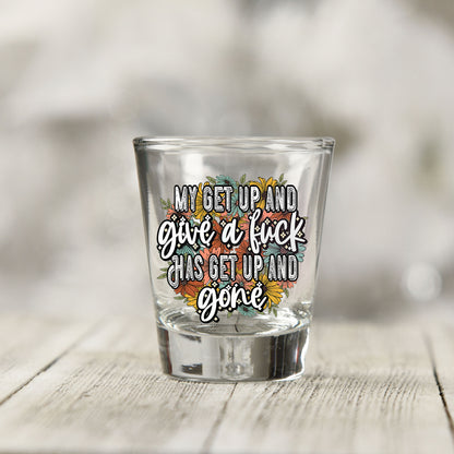 Close-up of the My Get Up and Give a F*ck UV DTF transfer on a clear shot glass