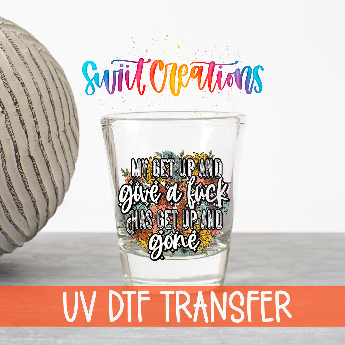 My Get Up and Give a F*ck UV DTF transfer on a clear shot glass with the Swiit Creations logo and UV DTF Transfer banner