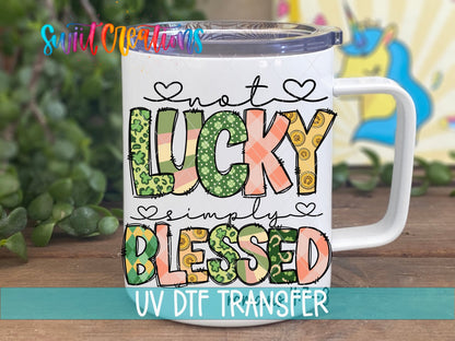 Not Lucky Simply Blessed UV DTF transfer on a white stainless steel mug with a lid