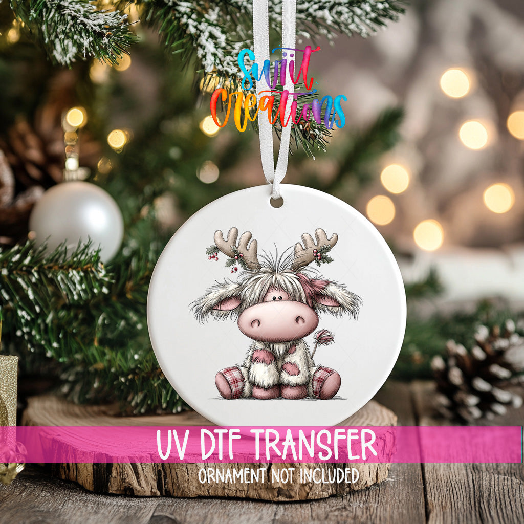 Christmas Highland cow UV DTF transfer displayed on a round ornament mockup