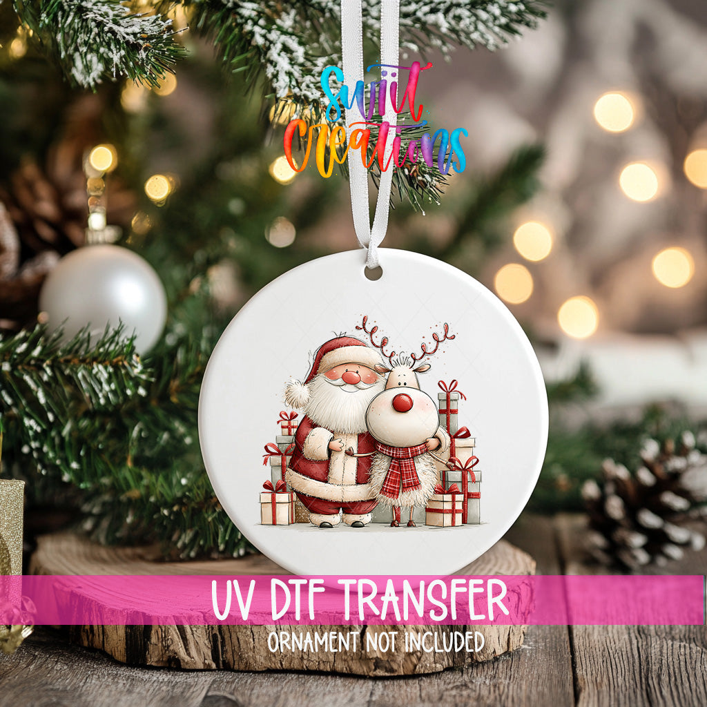 Santa and reindeer ornament UV DTF transfer surrounded by white presents with red bows, mockup view 2