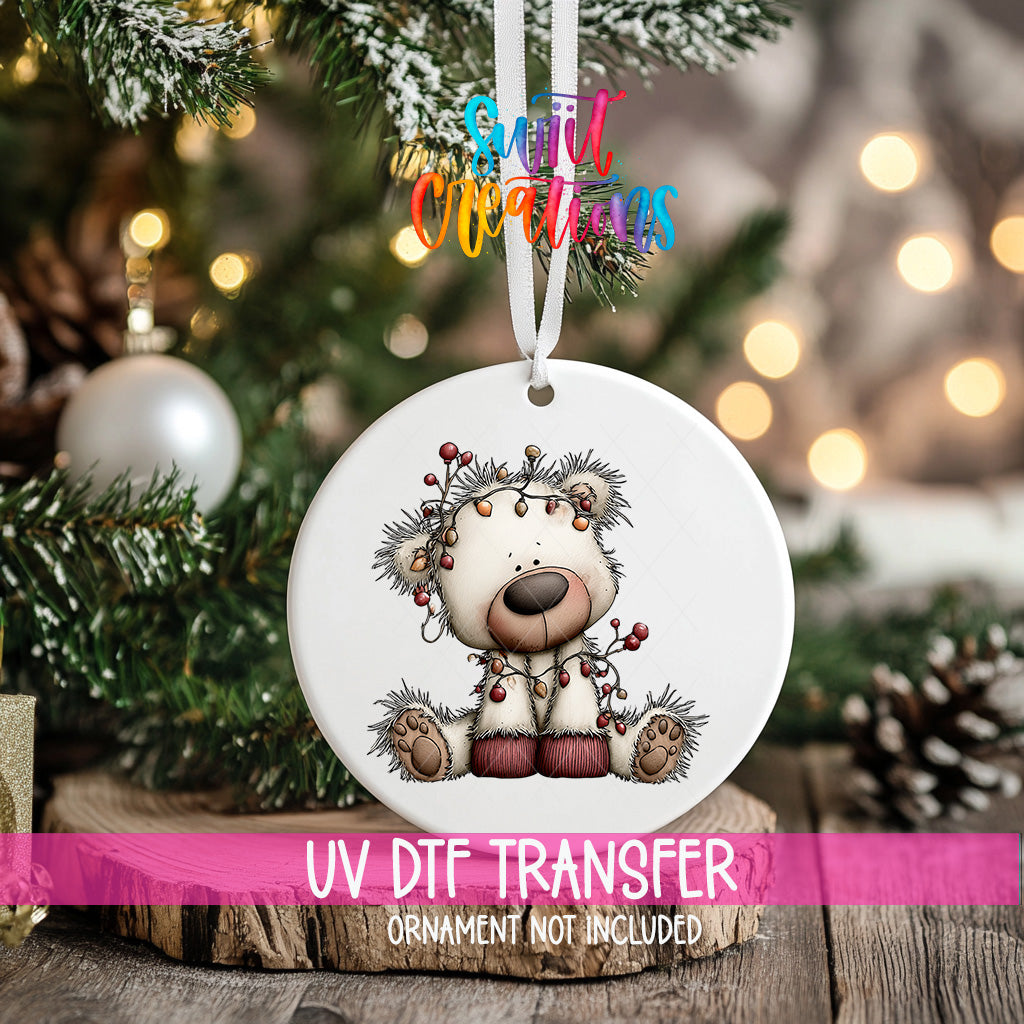 White Christmas bear ornament UV DTF transfer tangled in colorful holiday lights, mockup view 2
