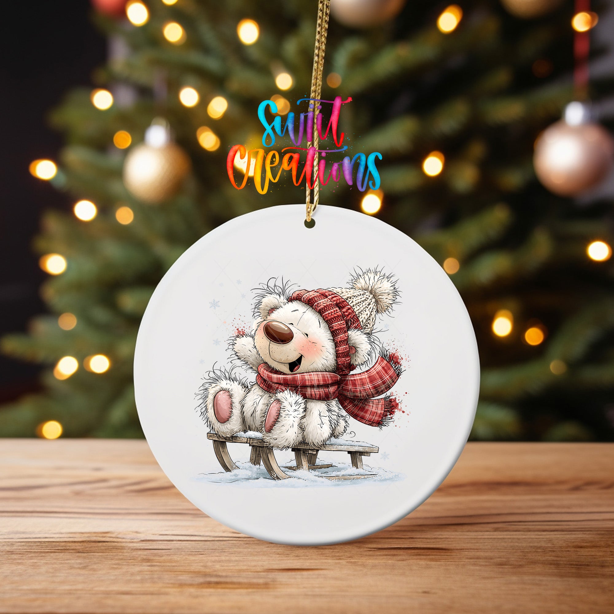 White Christmas bear ornament UV DTF transfer beside decorated tree and wrapped gifts, mockup view 4