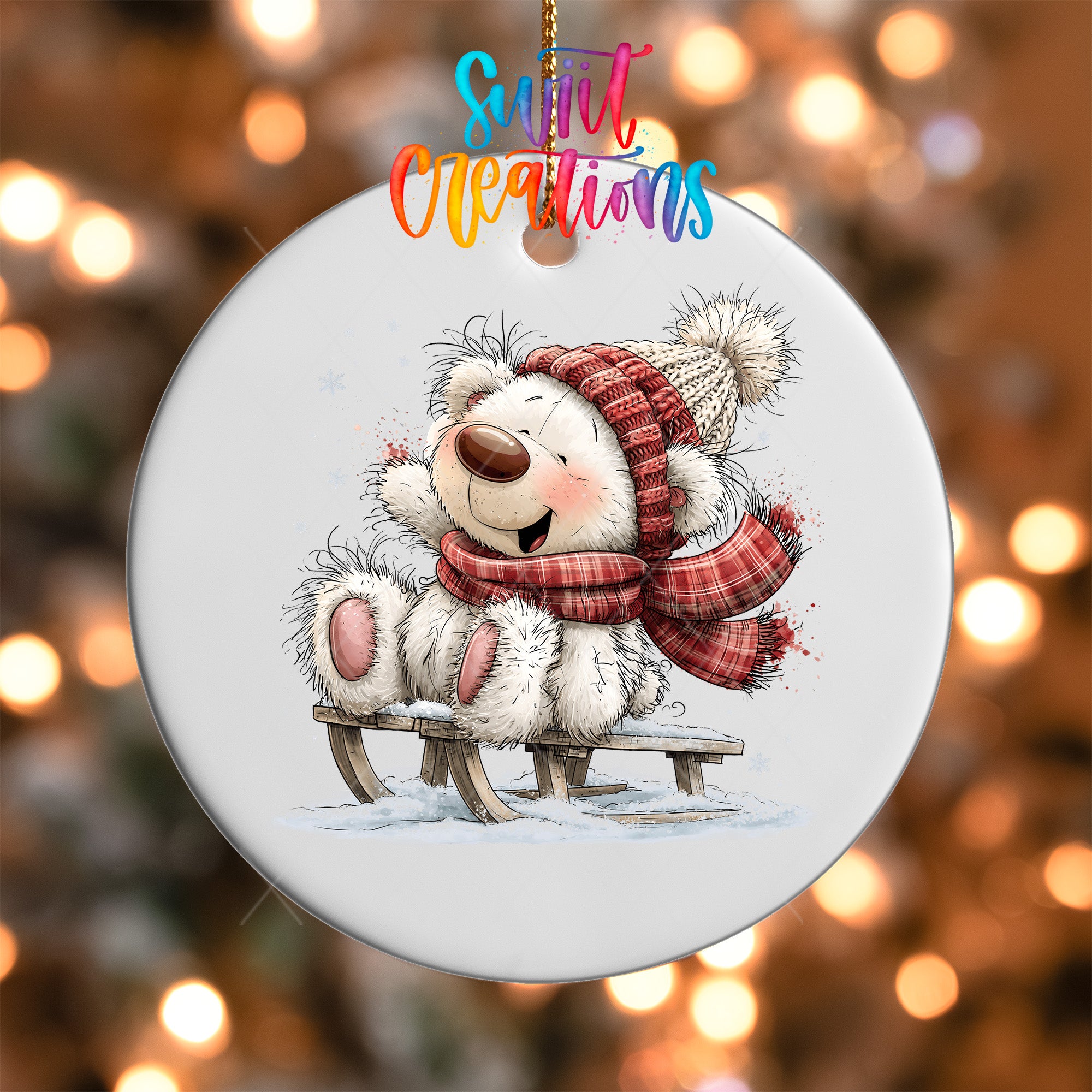 White Christmas bear ornament UV DTF transfer beside decorated tree and wrapped gifts, mockup view 5