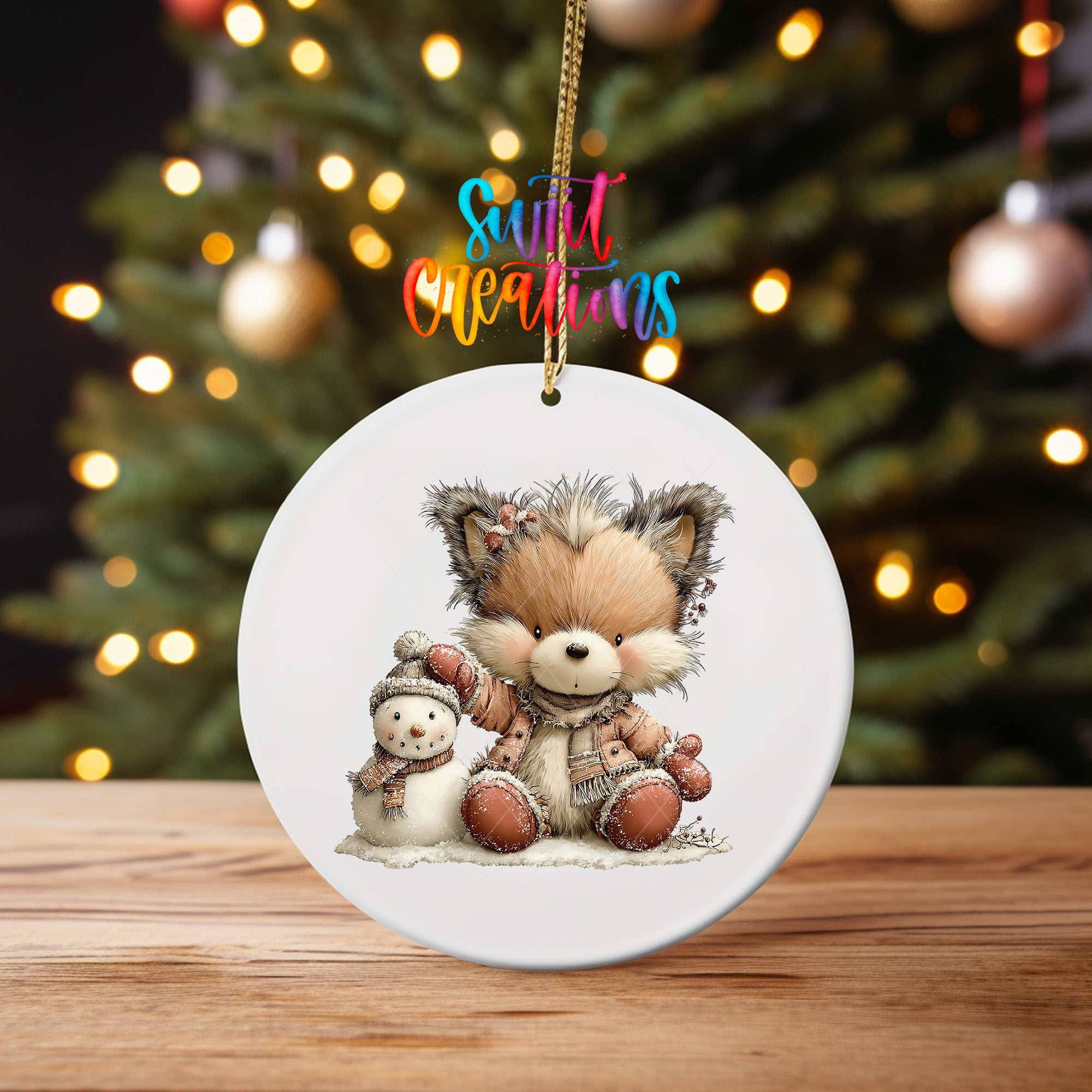 Winter fox and snowman ornament UV DTF transfer in blush pink snowy clothing, mockup view 4