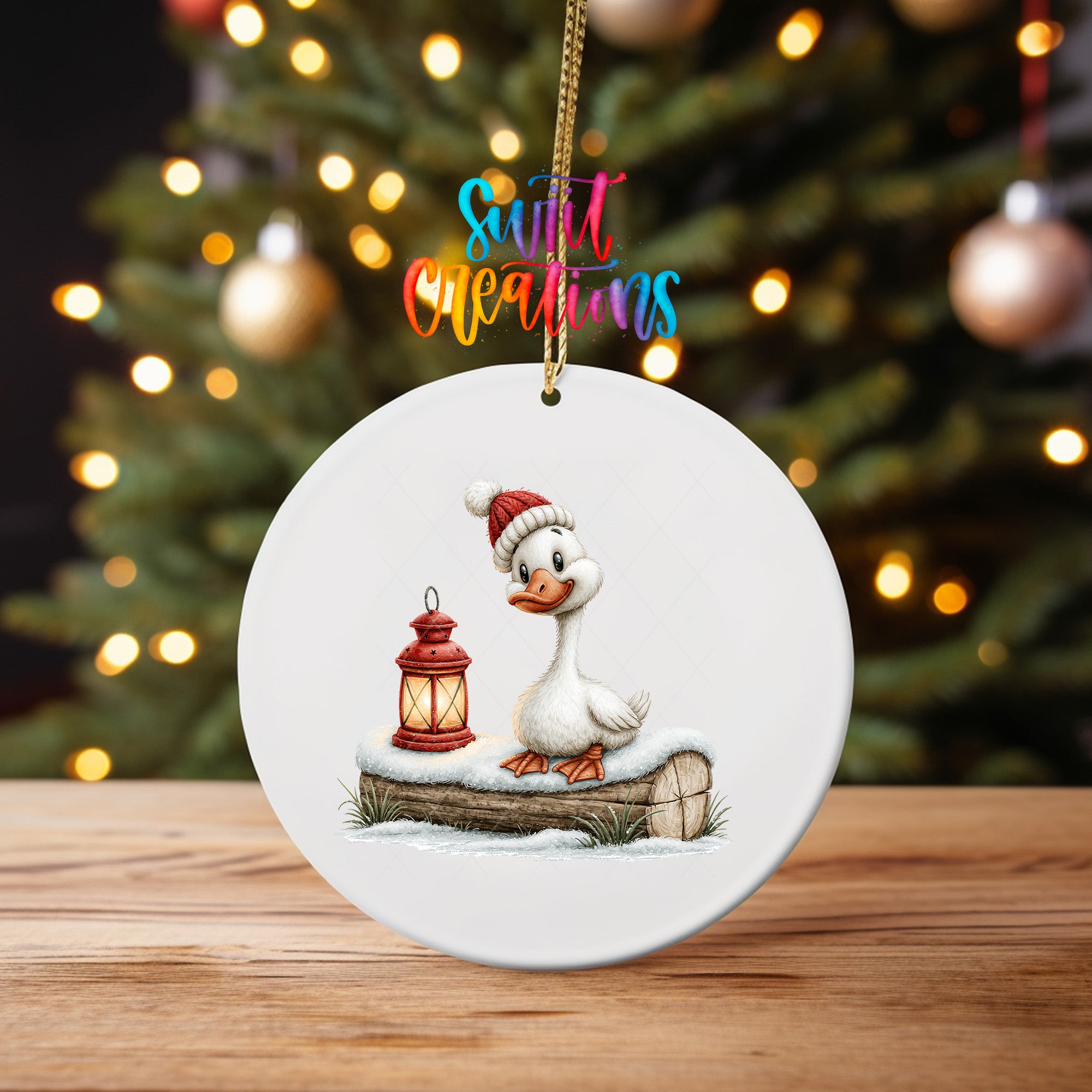 Christmas goose ornament UV DTF transfer in knit hat beside glowing red lantern, mockup view 4