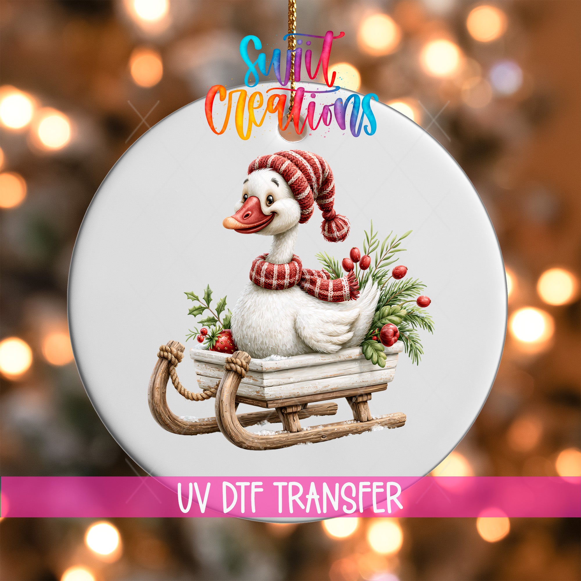 Christmas goose ornament UV DTF transfer riding wooden sleigh with greenery and red berries, mockup view 1