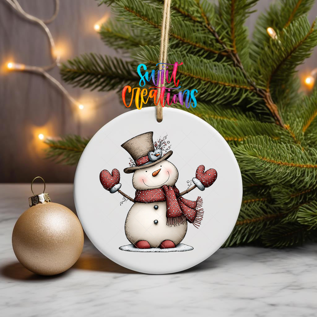 Whimsical snowman ornament UV DTF transfer with tall top hat, red scarf, and dotted mittens, mockup view 3