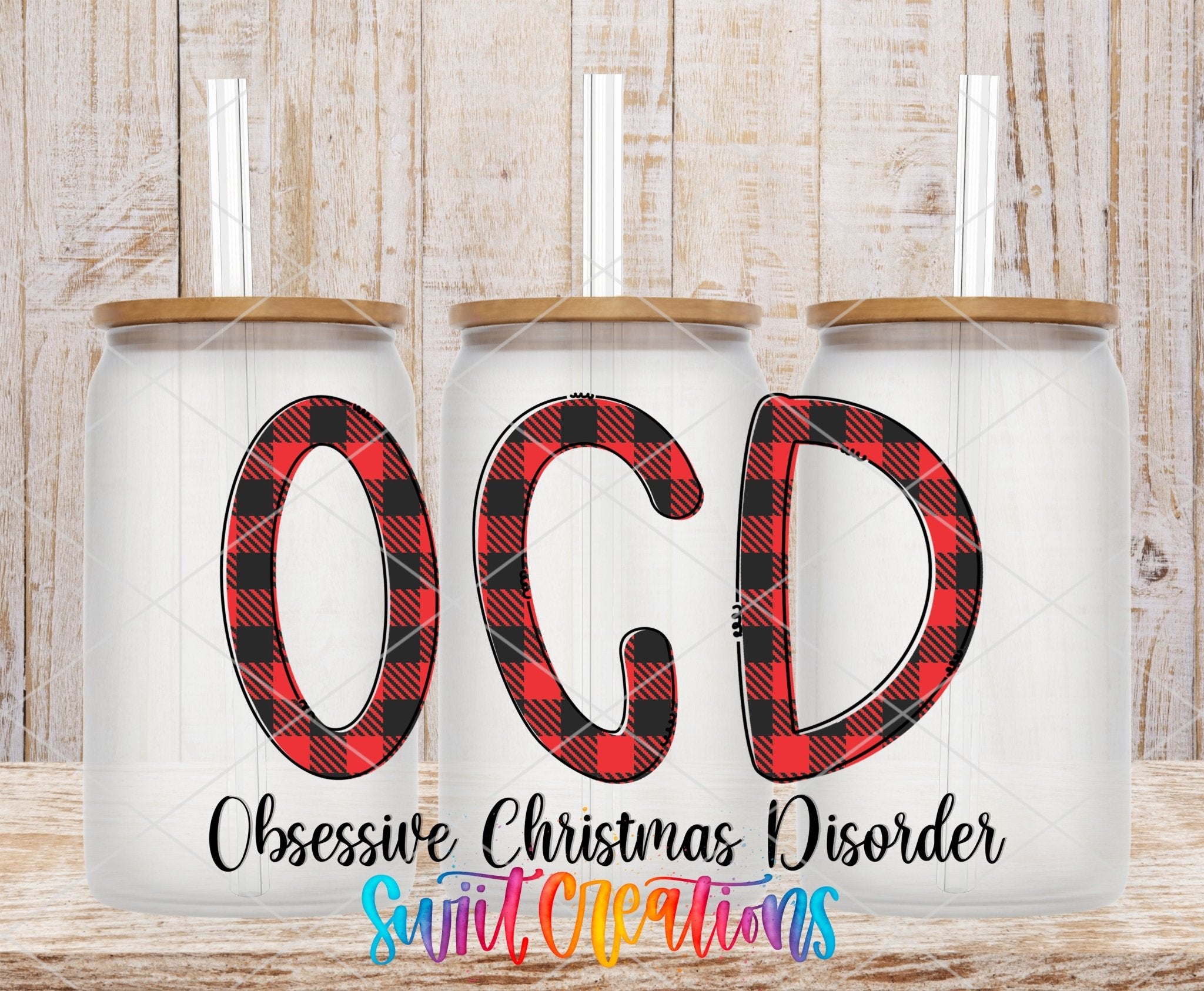 OCD Obsessive Christmas Disorder UV DTF transfer applied to a clear glass can set from Swiit Creations