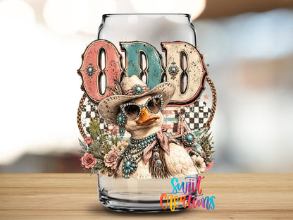 Odd Duck Western Glam UV DTF transfer applied to a clear glass can from Swiit Creations