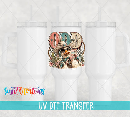 Odd Duck Western Glam UV DTF transfer applied to a white tumbler set from Swiit Creations