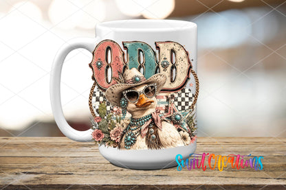 Odd Duck Western Glam UV DTF transfer displayed on a white ceramic mug from Swiit Creations