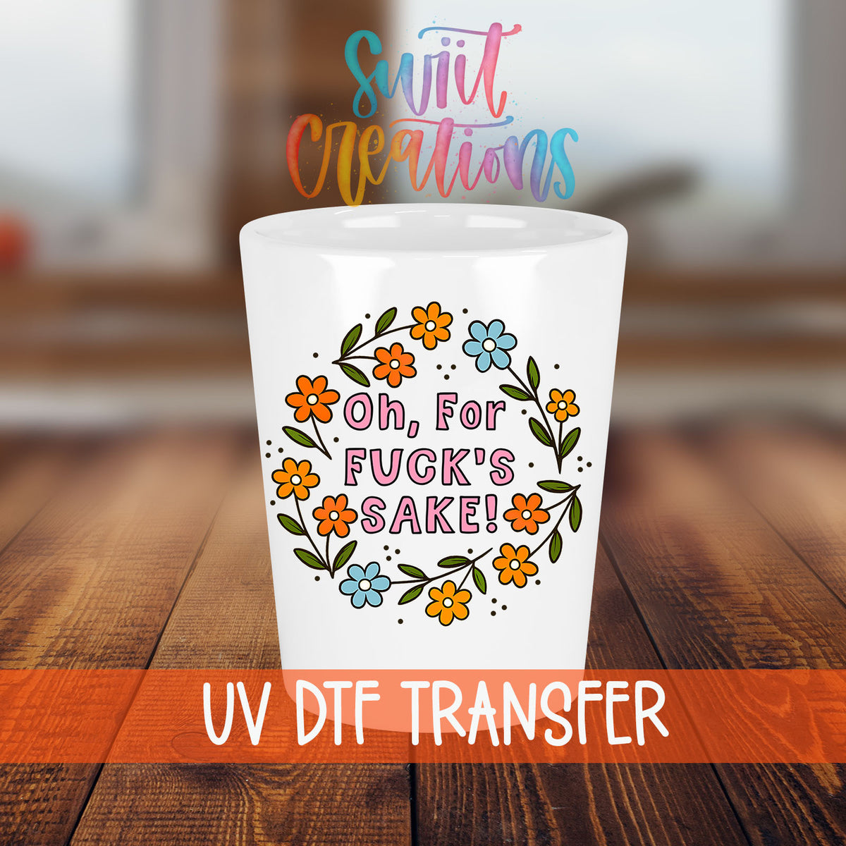 Oh For Fuck's Sake Floral shot glass transfer on a white shot glass on a wooden table