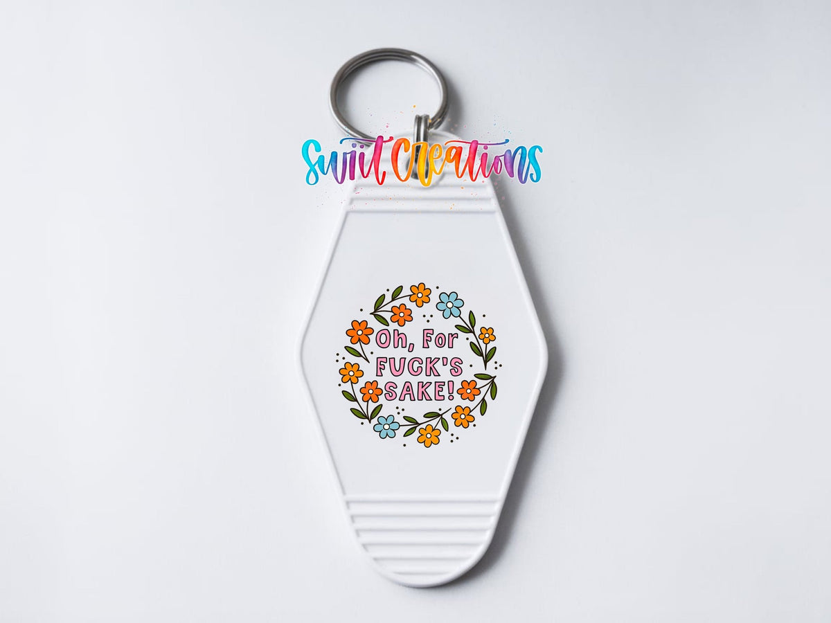 Close-up of the Oh for F*ck's Sake UV DTF transfer on a white motel keychain