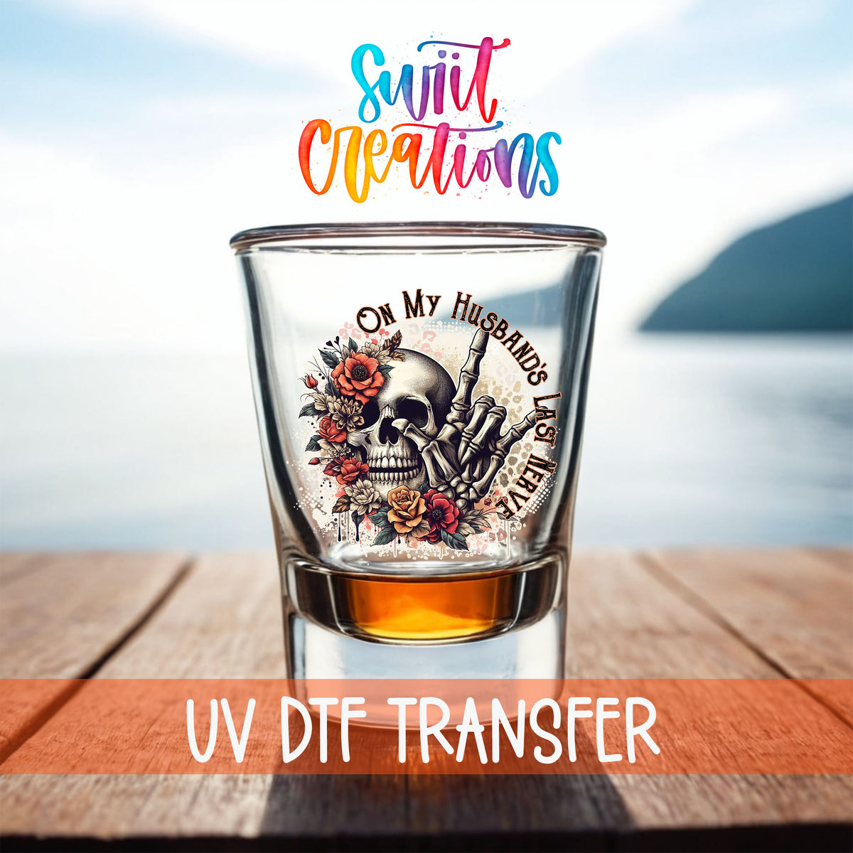 On My Husband's Last Nerve shot glass UV DTF transfer on a filled shot glass on a dock by the water