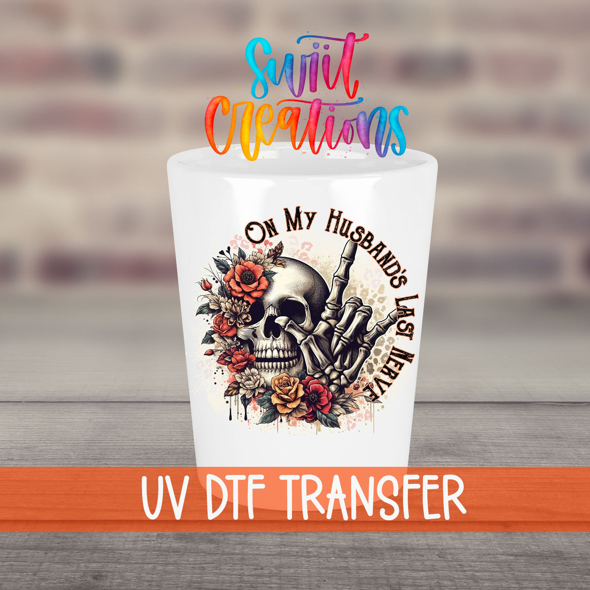 On My Husband's Last Nerve UV DTF transfer on a white shot glass in front of a brick wall