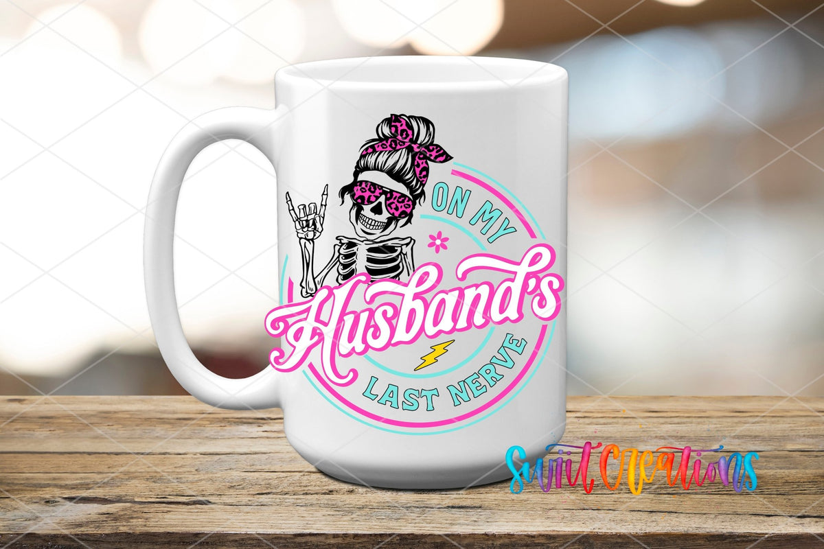 On My Husband's Last Nerve pink messy bun skeleton UV DTF transfer on a white ceramic coffee mug