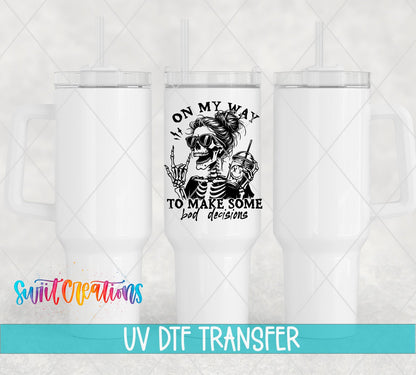 On My Way to Make Some Bad Decisions UV DTF transfer on white 40 oz tumblers