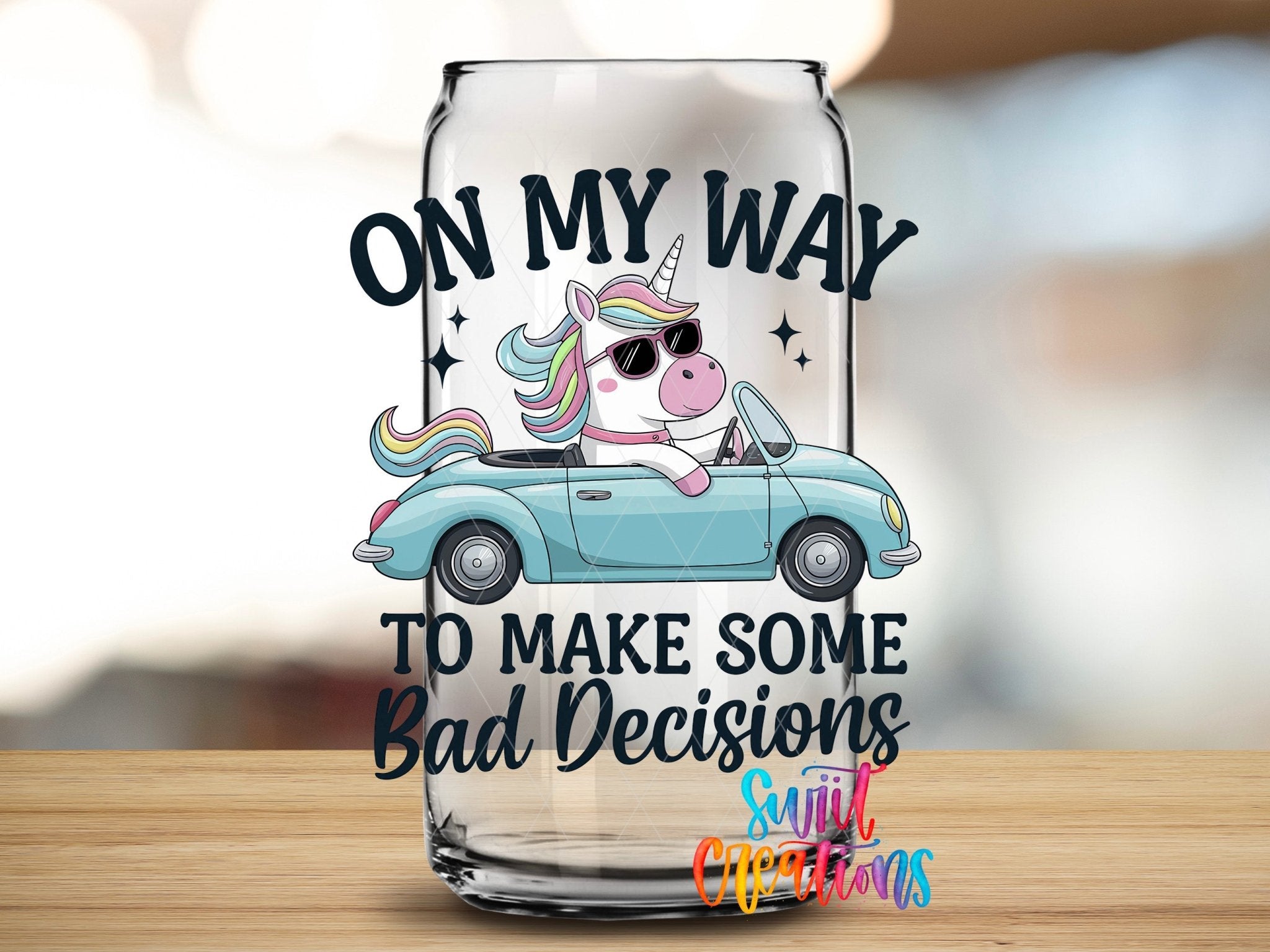 On My Way To Make Some Bad Decisions Unicorn UV DTF transfer applied to a clear glass can from Swiit Creations