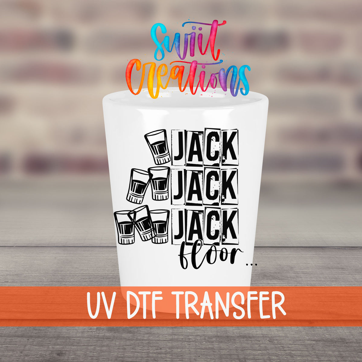 One Jack Two Jack Three Jack Floor UV DTF transfer on a white shot glass in front of a brick wall