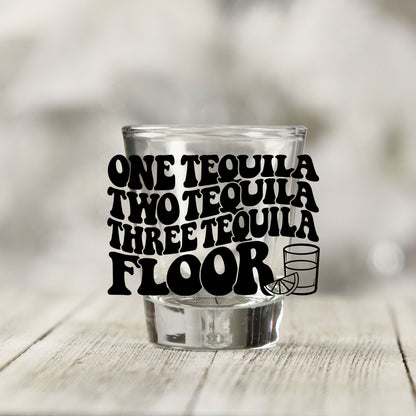 Close-up of the One Tequila Two Tequila UV DTF transfer on a clear shot glass