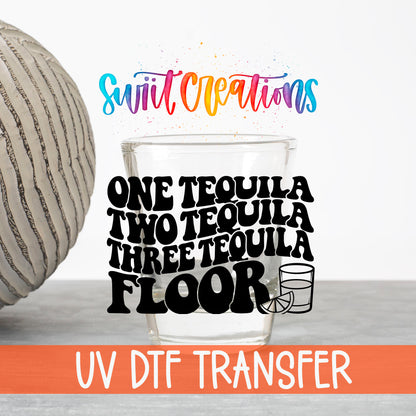 One Tequila Two Tequila UV DTF transfer on a clear shot glass with the Swiit Creations logo and UV DTF Transfer banner