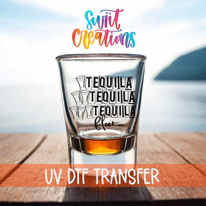 One Tequila Two Tequila Three Tequila Floor shot glass UV DTF transfer on a filled shot glass on a dock by the water