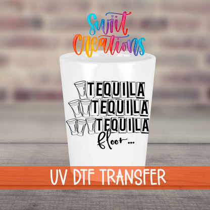 One Tequila Two Tequila Three Tequila Floor UV DTF transfer on a white shot glass in front of a brick wall