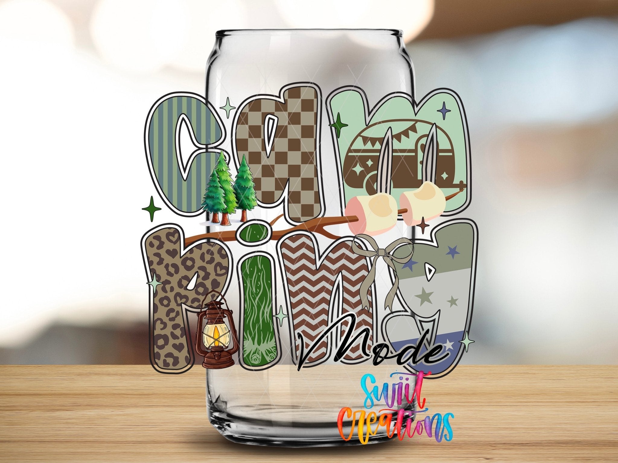 Outdoor Camping Mode Nature Design UV DTF transfer applied to a clear glass can from Swiit Creations