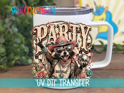 Party Animal Western Glam Raccoon UV DTF transfer displayed on a white coffee mug from Swiit Creations