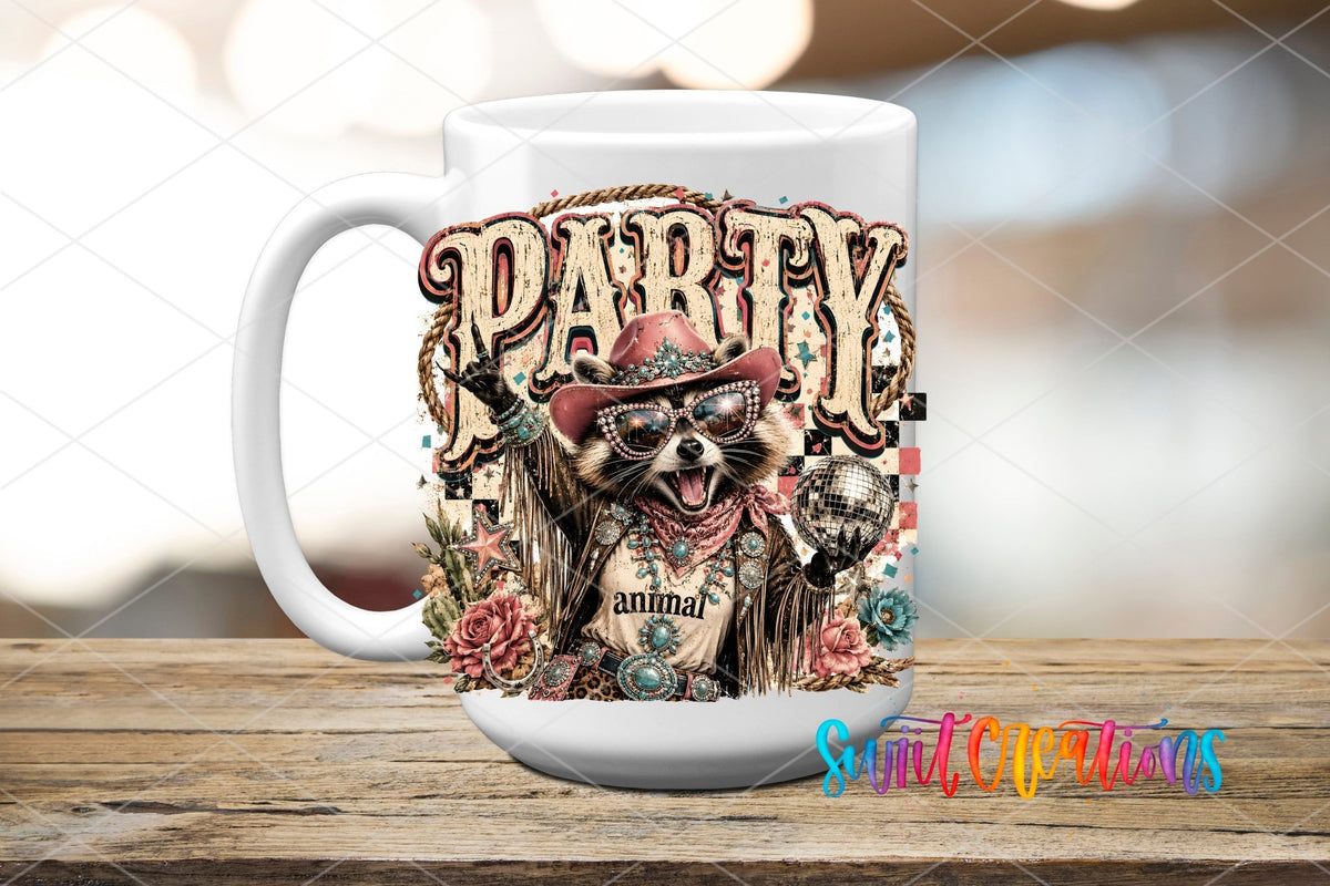 Party Animal Western Glam Raccoon UV DTF transfer displayed on a white ceramic mug from Swiit Creations