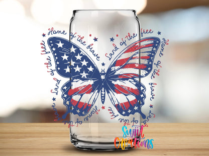 Close-up of the Land of the Free UV DTF transfer on a clear glass can