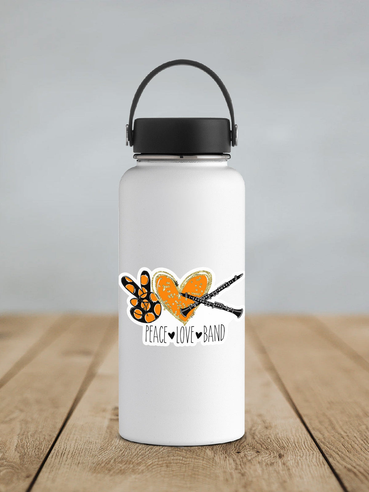 Peace Love Band Clarinet sticker on a white insulated water bottle