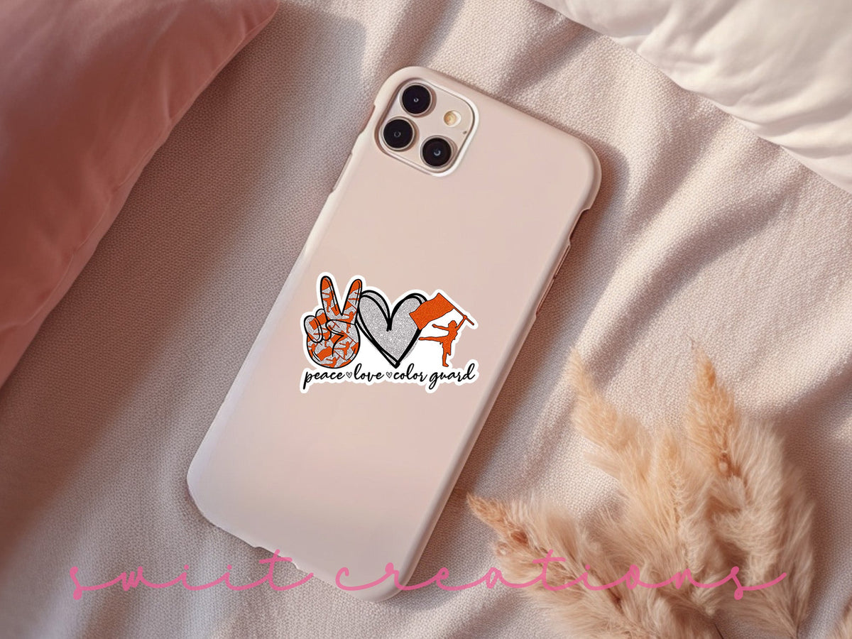Orange Peace Love Color Guard sticker on a pink phone case