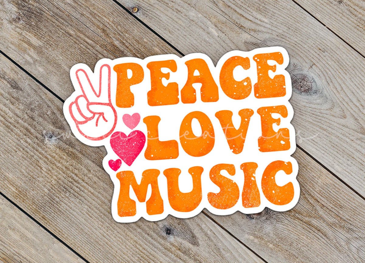 Close-up of the Peace Love Music sticker on rustic wood