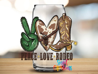 Close-up of the Peace Love Rodeo UV DTF transfer on a clear glass can