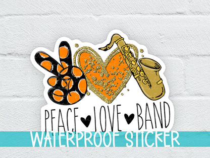 Peace Love Band Saxophone sticker on a white brick background with a waterproof sticker banner