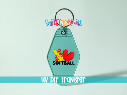 Peace Love Softball UV DTF transfer on a teal motel keychain on a mint background