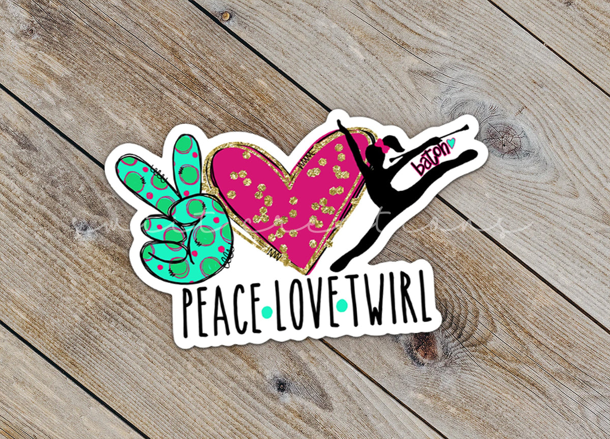 Close-up of the Peace Love Twirl sticker on rustic wood