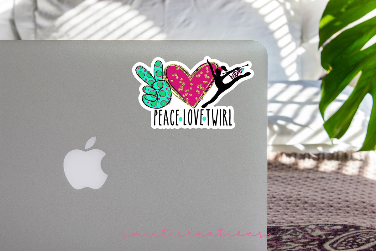 Peace Love Twirl sticker on the lid of a silver laptop