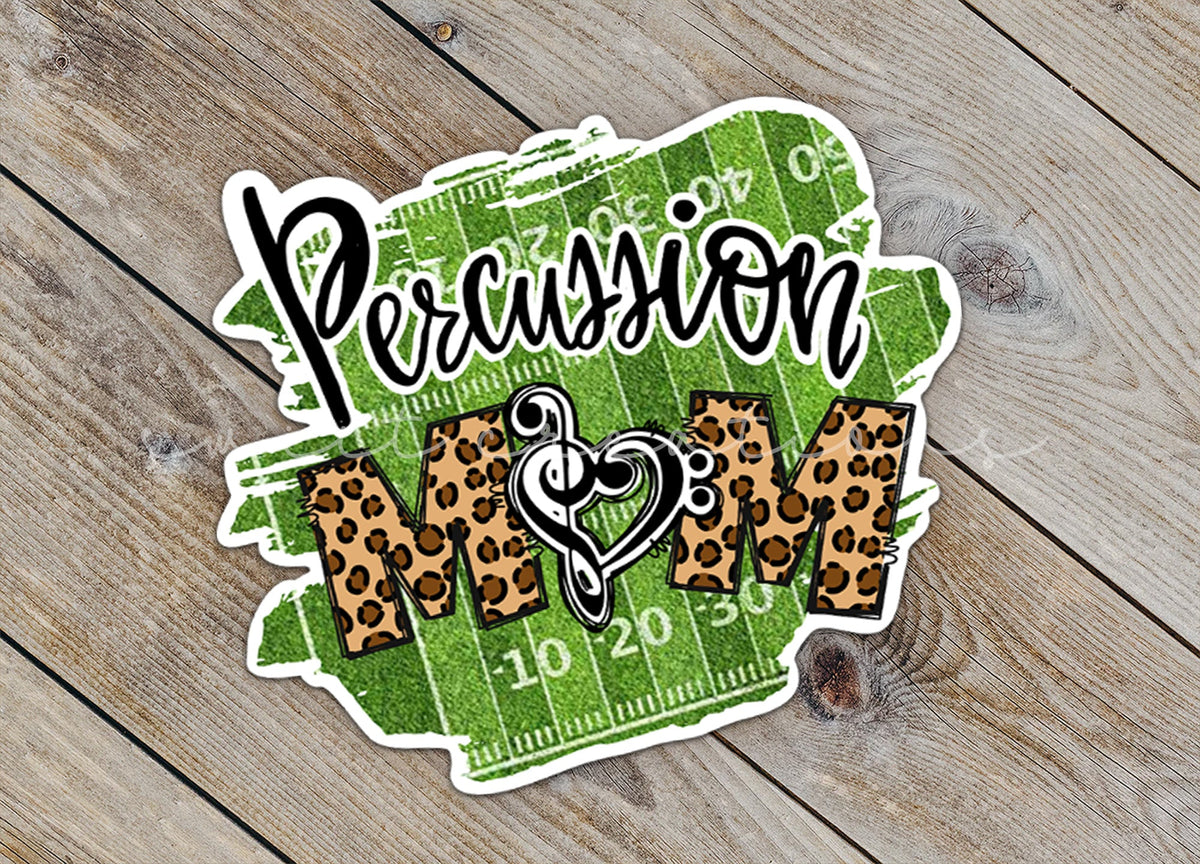 Close-up of the Percussion Mom sticker on rustic wood