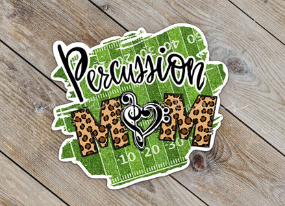 Close-up of the Percussion Mom sticker on rustic wood
