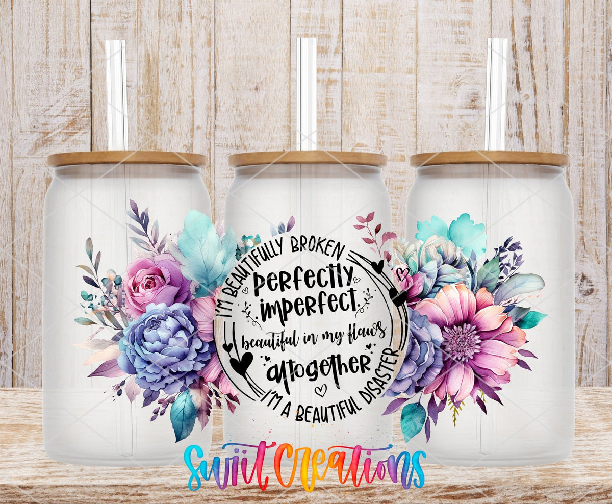 Perfectly Imperfect UV DTF wrap on three clear glass cans with bamboo lids